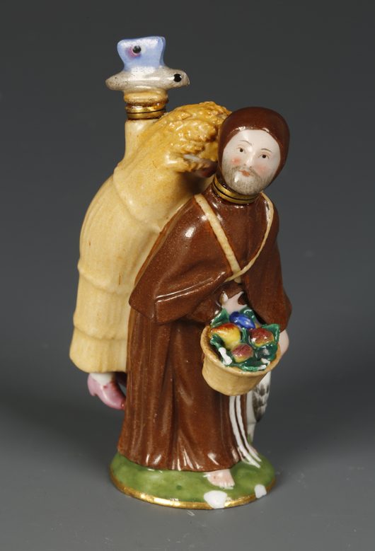 A curious Meissen porcelain scent flask in the form of a monk with a woman hiding in a wheat sheaf on his back, which made £700 ($1,080) at Duke’s in Dorchester in August. Image courtesy of Duke’s.